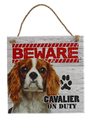 Beware of the dog pet signs. Cavalier on duty.