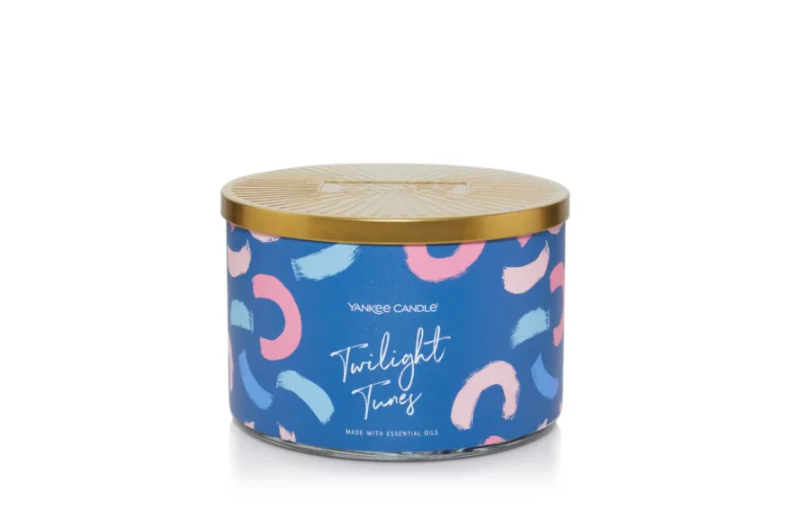 Yankee Candle Novelty 3 Wick Tumbler in Twilight Tunes scent, featuring a stylish tumbler with an embossed metal lid, emitting a fresh and harmonious fragrance.
