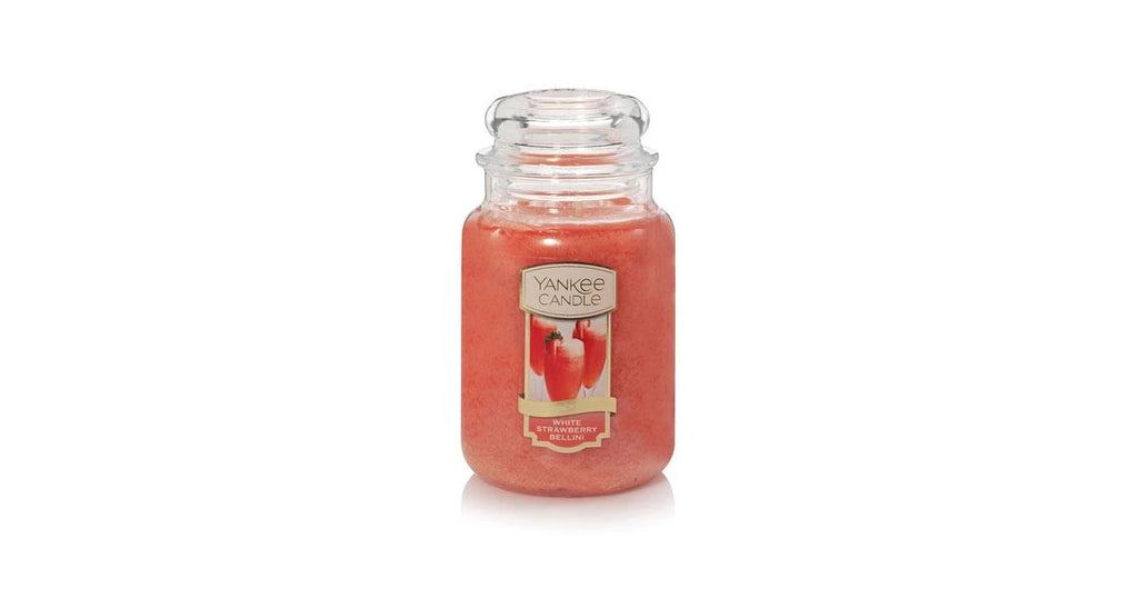 
Yankee Candle Large Jar in White Strawberry Bellini scent, featuring an iconic glass jar with lid, emitting a delightful and refreshing fragrance.

