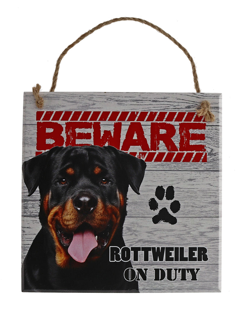 Beware of the dog pet signs. Rottweiler on duty.