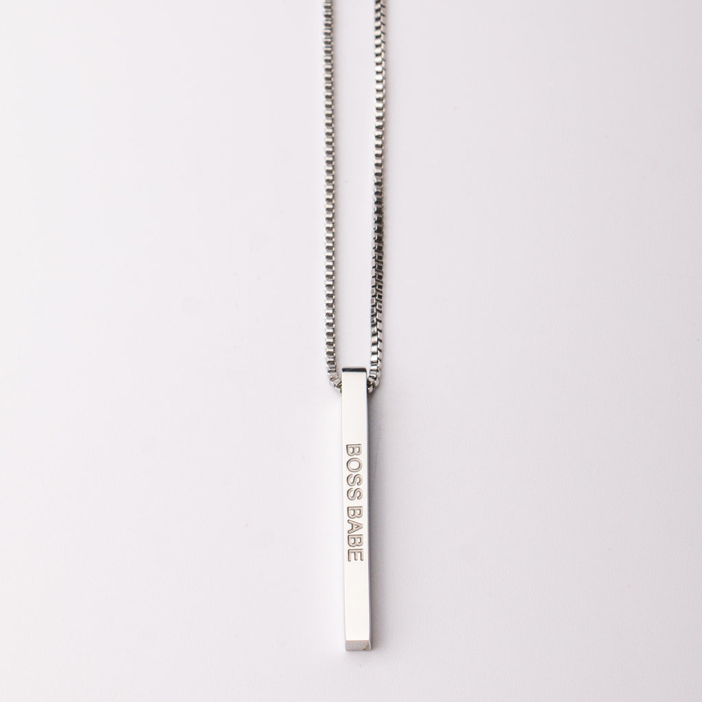 Fierce.One stainless steel bar pendant necklace with phrase "Boss Babe."