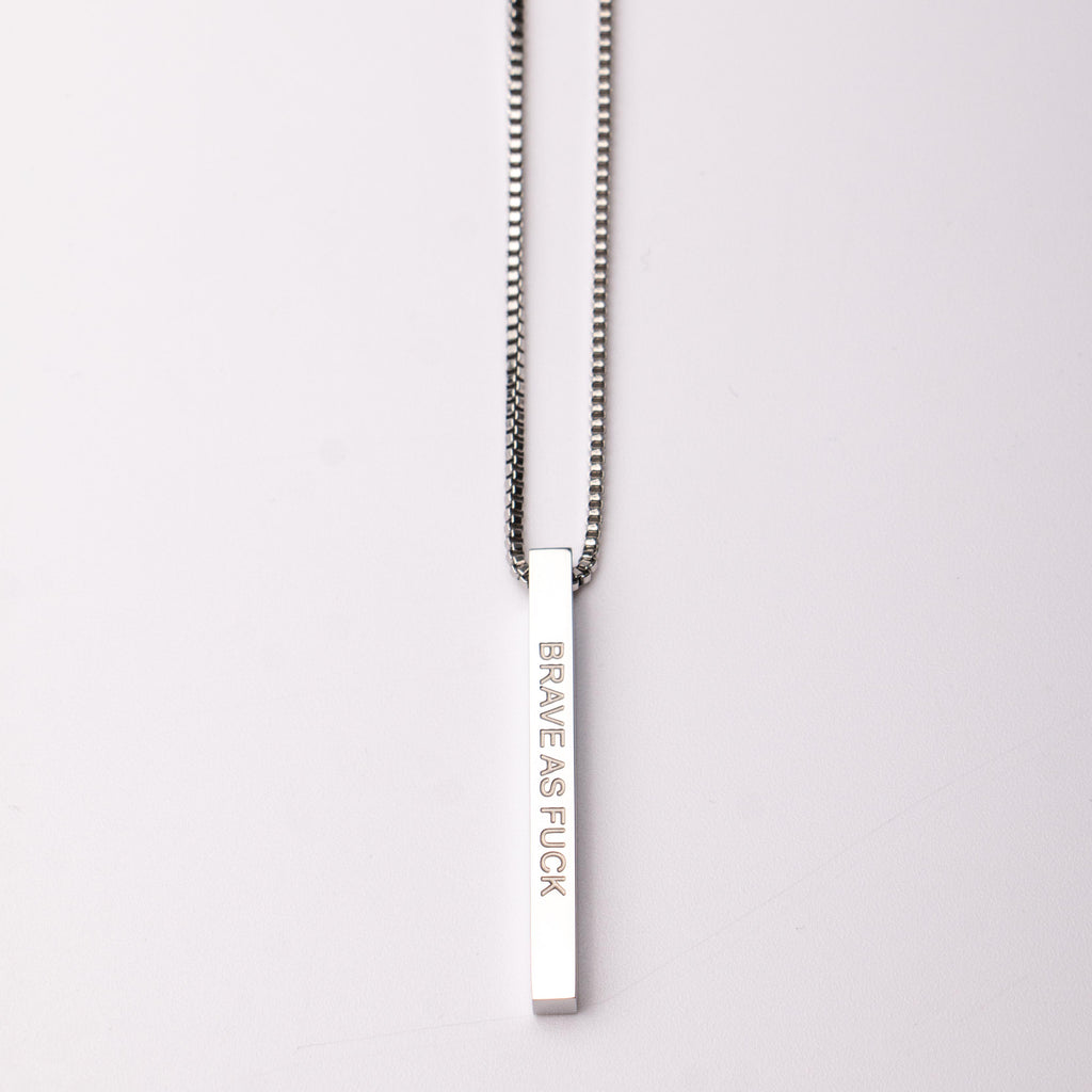 Fierce.One stainless steel bar pendant necklace with phrase "Brave as Fuck."