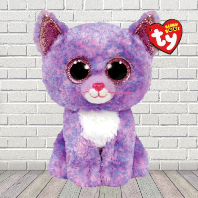 Cassidy the Lavender, purple TY beanie boo. Pink sparkly eyes. House background. 