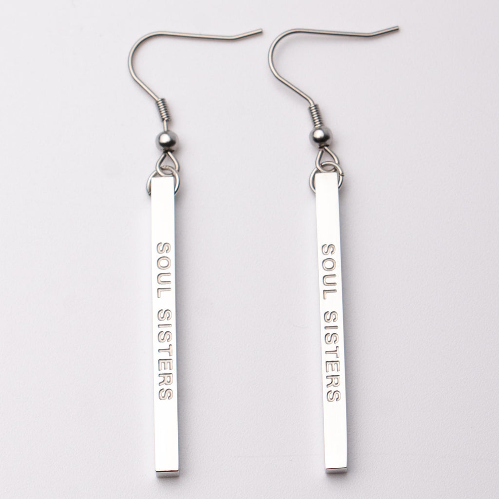 Fierce.One stainless steel bar earrings with the phrase "Soul Sisters."