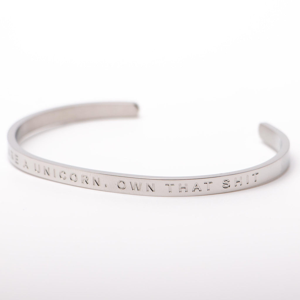 Fierce One stainless steel bangle with phrase "You are a unicorn, own that shit."